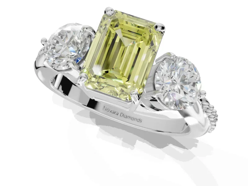 Emerald Cut Three Stone Engagement Ring Setting for a Fancy Yellow Lab-Grown Diamond | Tapered Pave Band | White Gold