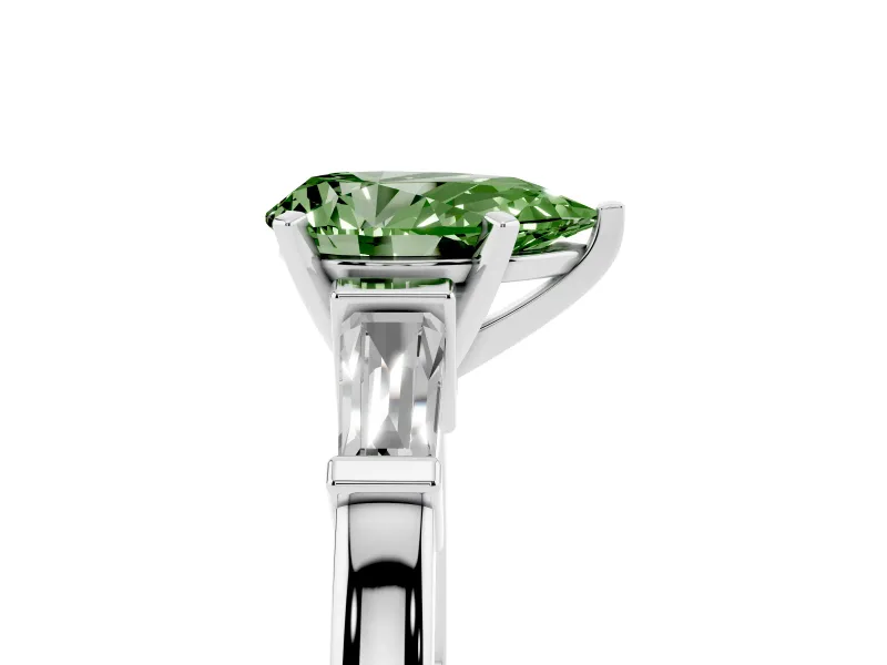 Fancy Green Pear Cut Diamond Solitaire Ring Set in Platinum with Tapered Baguette Accents and Prong Setting