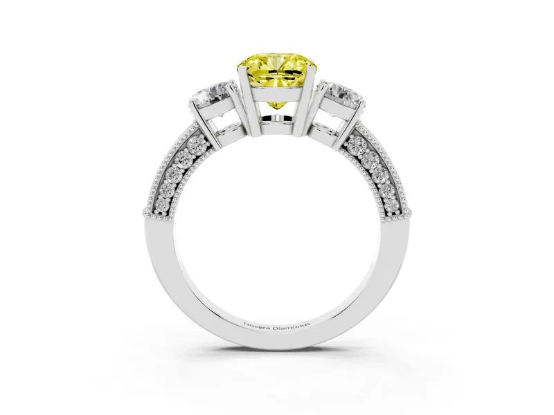 Fancy Yellow Cushion Cut Diamond Three-Stone Ring Set in White gold with Round Side Stones and Pavé Band