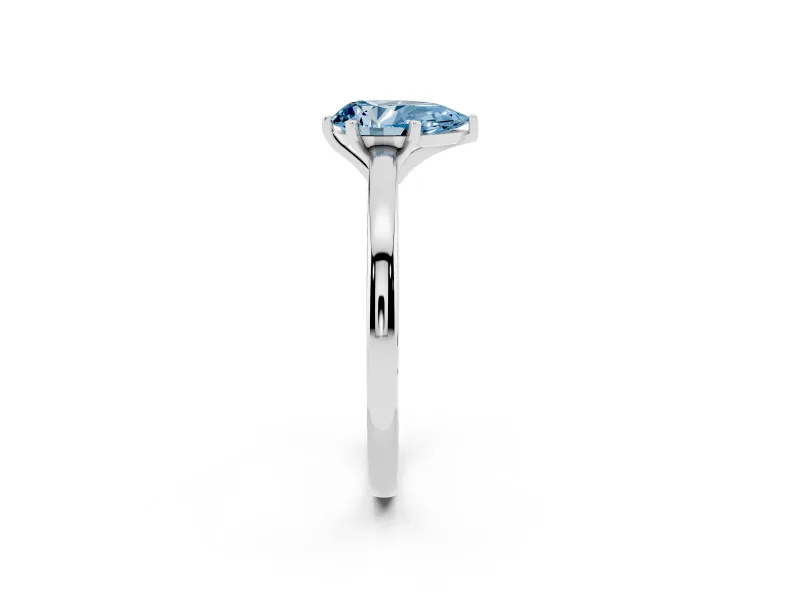 Fancy Blue Pear Cut Diamond Solitaire Engagement Ring Set in Silver with Prong Setting on a Classic Band