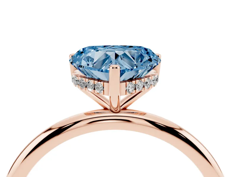 Fancy Blue Heart Cut Diamond Solitaire Engagement Ring Set in Rose gold with Prong Setting and Polished Band