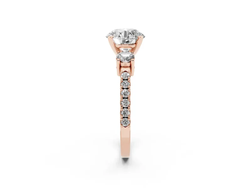 Three-Stone Round Cut Diamond Pavé Band Ring Set in Rose gold with Prong Setting