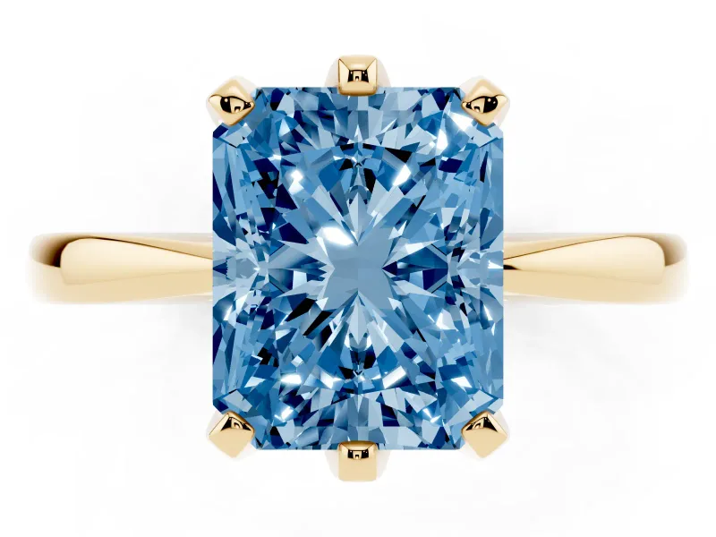 Radiant Cut Tapered Solitaire Engagement Ring Setting for a Fancy Blue Lab-Grown Diamond | Claw Prong Head | Yellow Gold