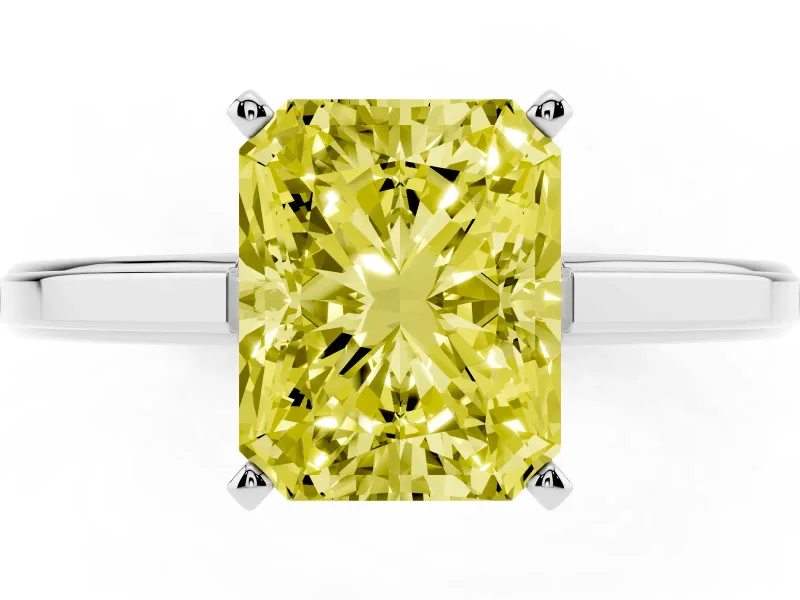 Fancy Yellow Radiant Cut Diamond Solitaire Ring Set in White gold with Prong Setting and Classic Band