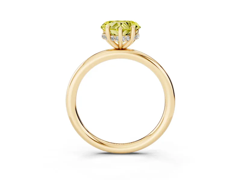 Fancy Yellow Heart Cut Diamond Solitaire Ring Set in Yellow gold with Thin Band and Prong Setting