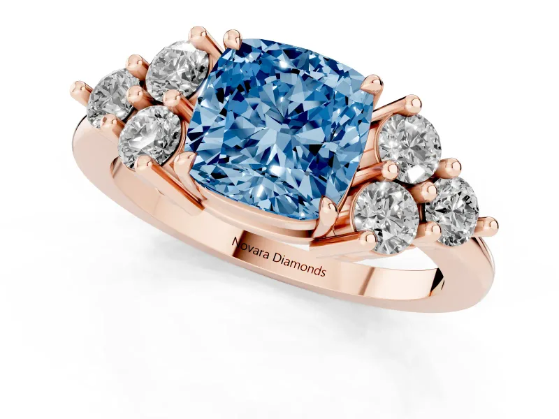 Fancy Blue Cushion Cut Diamond Solitaire Ring Set in Rose gold with Cluster Accents on Each Side