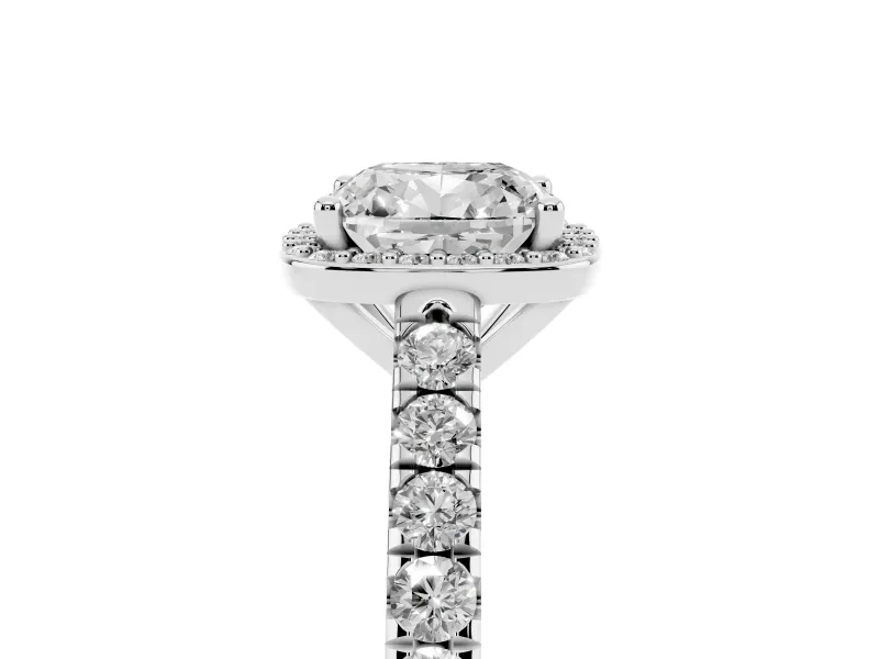 Cushion Cut Diamond Halo Engagement Ring Set in Silver with Pavé Band and Prong Setting