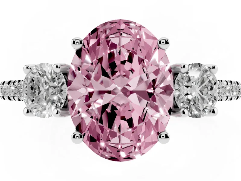 Fancy Pink Oval Cut Diamond Three-Stone Ring Set in White gold with Pavé Band and Graduated Sides