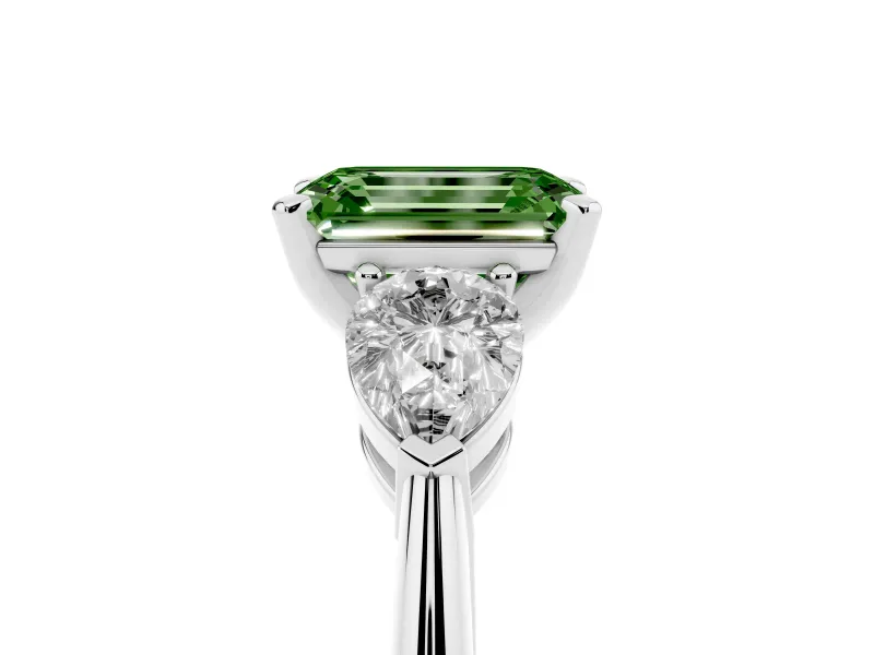 Fancy Green Three-Stone Emerald Cut Diamond Ring Set in Platinum with Pear Side Stones and Prong Setting