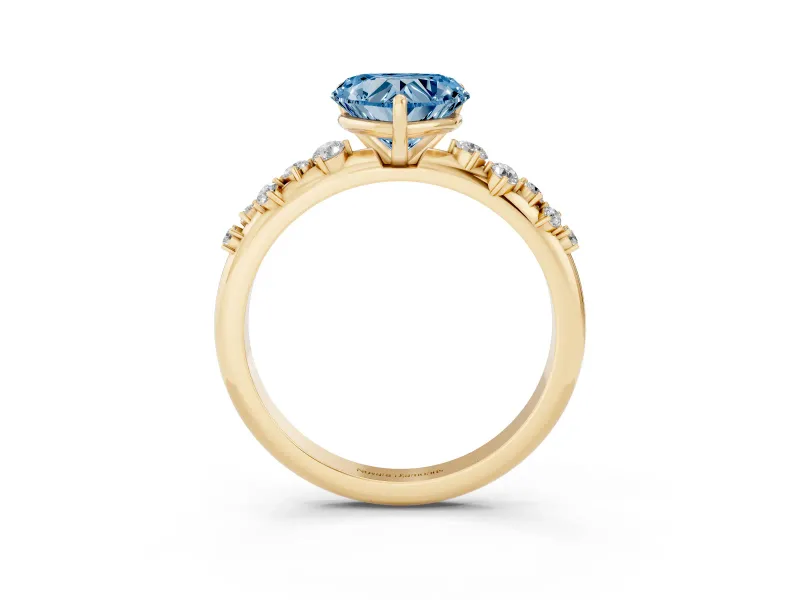 Fancy Blue Heart Cut Diamond Cluster Solitaire Ring Set in Yellow gold with Prong Setting