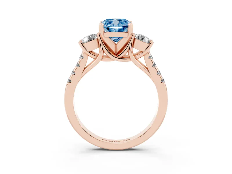Fancy Blue Three-Stone Cushion Cut Diamond Pavé Band Ring Set in Rose gold with Prong-Set Trio
