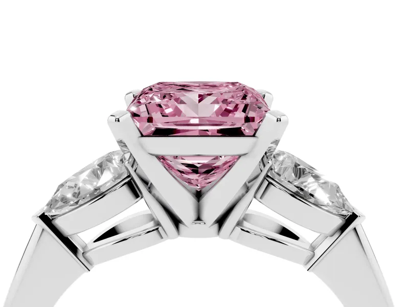 Fancy Pink Three-Stone Princess Cut Diamond Ring Set in White gold with Pear Side Stones and Prong Setting