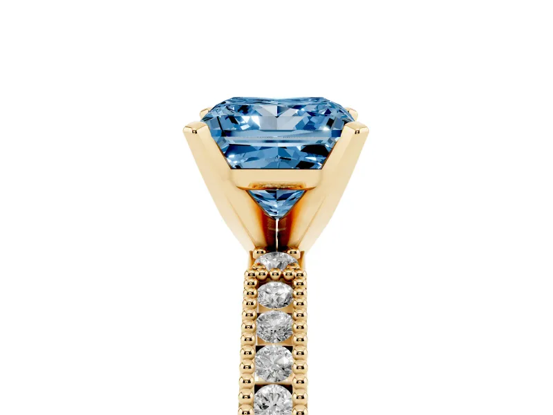Fancy Blue Princess Cut Diamond Solitaire Ring Set in Yellow gold with Slim Pavé Band and Prong Setting