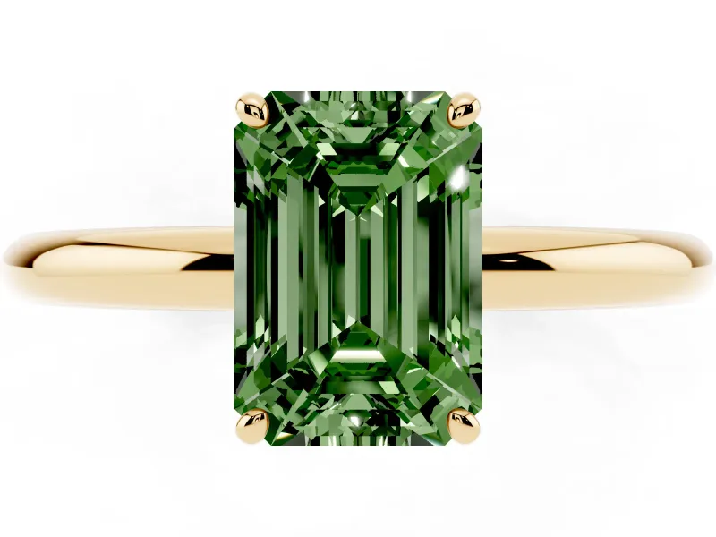 Fancy Green Emerald Cut Diamond Solitaire Ring Set in Yellow gold with Prong Setting on a Polished Plain Band