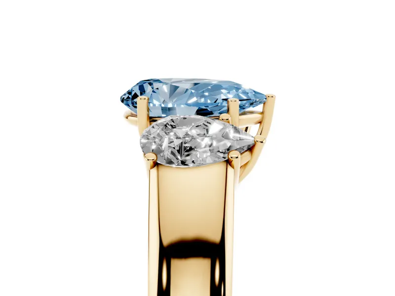 Pear-Shaped 3 Stone Engagement Ring Setting for a Fancy Blue Lab-Grown Diamond | Yellow Gold