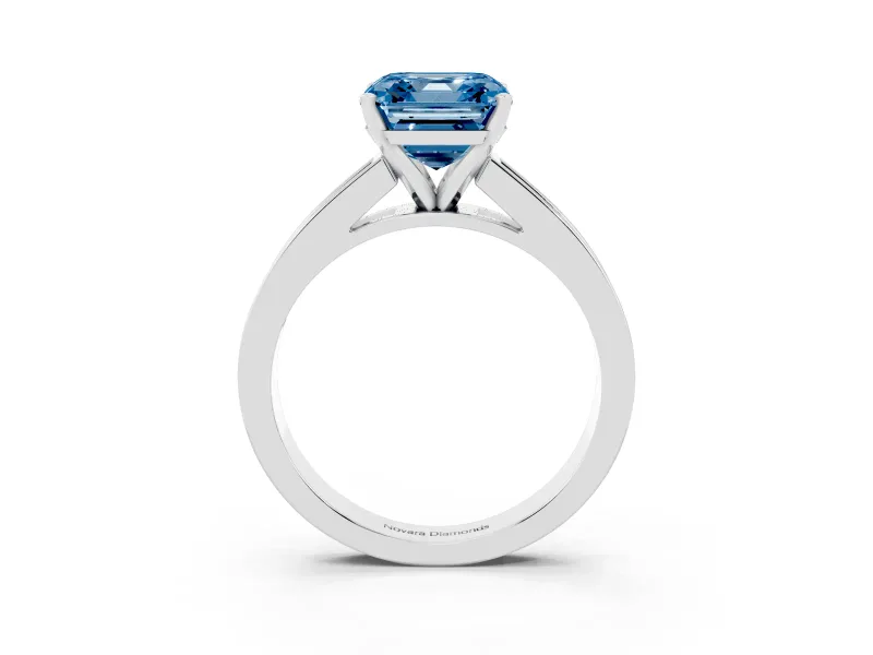 Fancy Blue Asscher Cut Diamond Solitaire Ring Set in Platinum with Channel-Set Band and Prong Setting