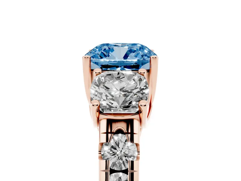 Fancy Blue Cushion Cut Diamond Three-Stone Ring Set in Rose gold with Pavé Band