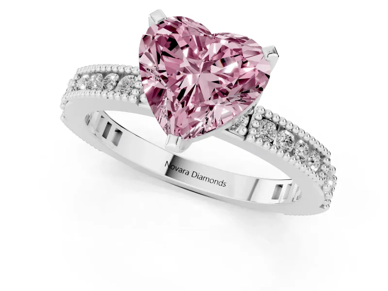 Fancy Pink Heart Cut Diamond Solitaire Ring Set in Platinum with Slim Pavé Band and Prong Setting