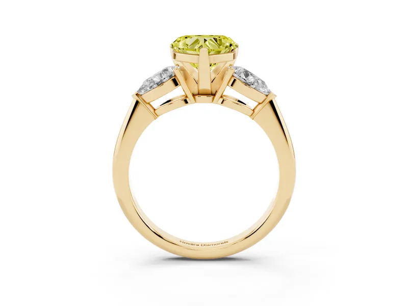 Fancy Yellow Three-Stone Heart Cut Diamond Ring Set in Yellow gold with Pear Side Stones and Prong Setting