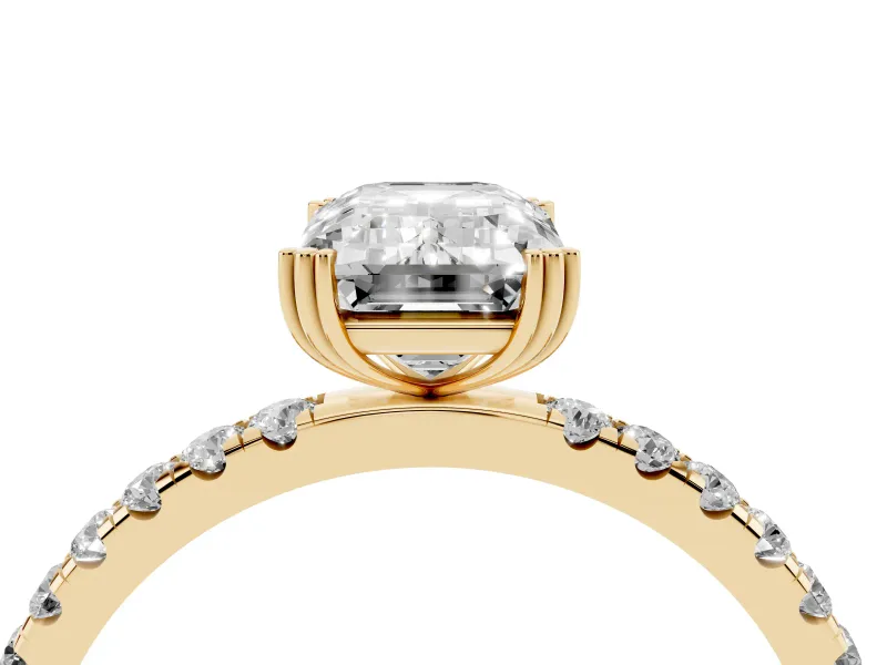 Emerald Cut Diamond Brilliant Solitaire Set in Yellow gold with Pavé Band and Claw Prong Setting