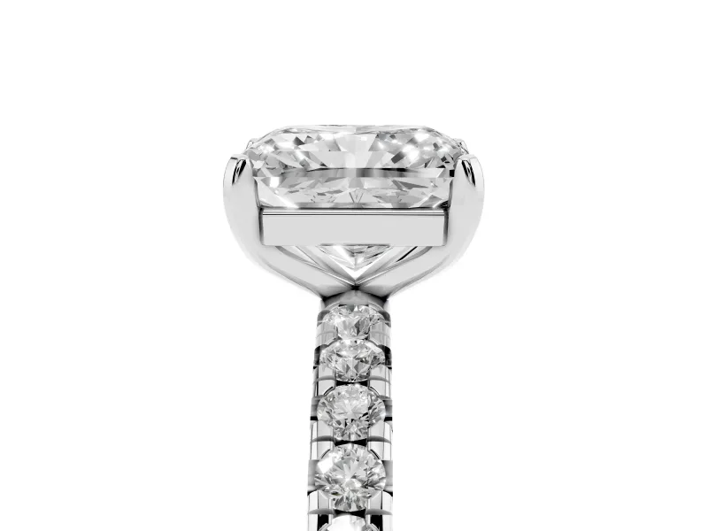 Radiant Cut Diamond Pavé Solitaire Ring Set in White gold with Round Band and Prong Setting