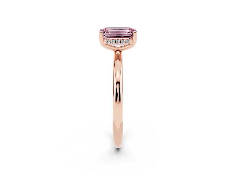 Fancy Pink Emerald Cut Diamond Solitaire Engagement Ring Set in Rose gold with Prong Setting and Polished Band