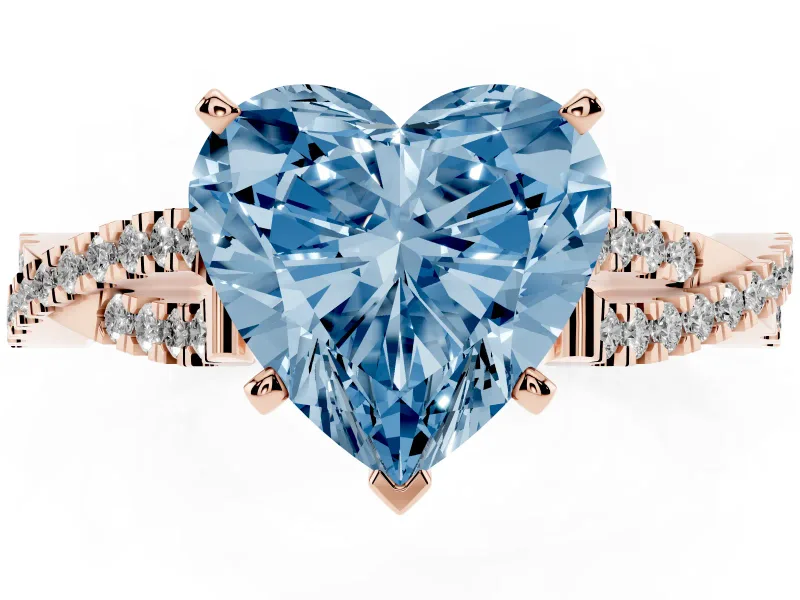 Fancy Blue Heart Cut Diamond Solitaire Engagement Ring Set in Rose gold with Twisted Pavé Band and Prong Setting