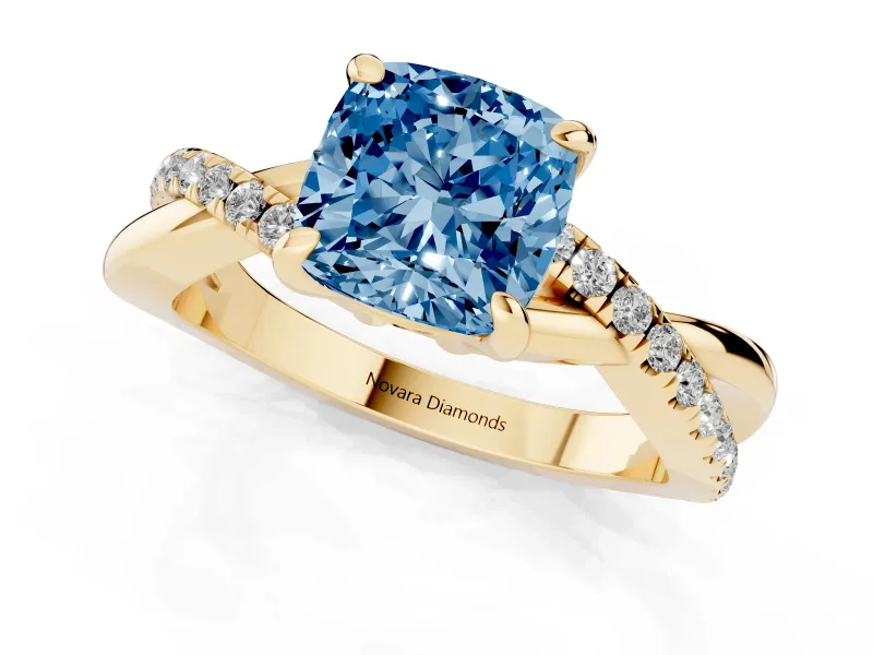 Fancy Blue Cushion Cut Diamond Twist Band Solitaire Set in Yellow gold with Pavé Accents and Prong Setting