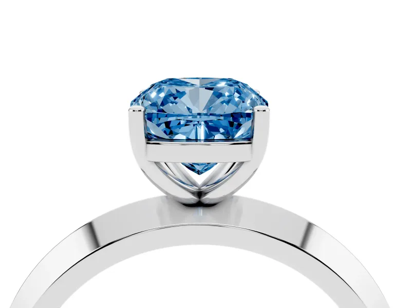Fancy Blue Cushion Cut Diamond Solitaire Engagement Ring Set in White gold with Flat Band and Prong Setting