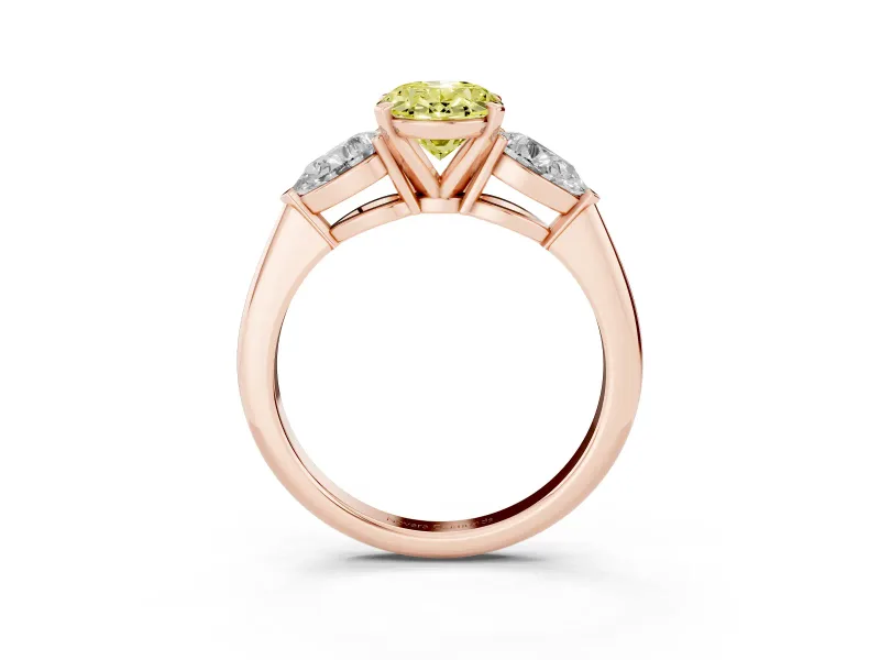 Fancy Yellow Three-Stone Oval Cut Diamond Ring Set in Rose gold with Pear Side Stones and Prong Setting