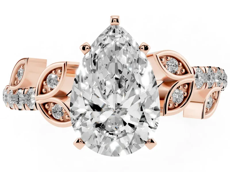 Pear Cut Diamond Solitaire Leaf-Inspired Ring Set in Rose gold with Pavé Band and Prong Setting