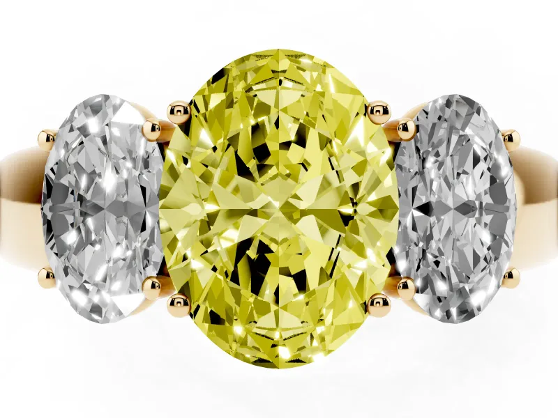 Fancy Yellow Three-Stone Oval Cut Diamond Ring Set in Yellow gold with Matching Prong Settings and Plain Band