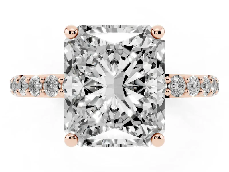 Radiant Cut Diamond Solitaire Ring Set in Rose gold with Round Pavé Band and Prong Setting