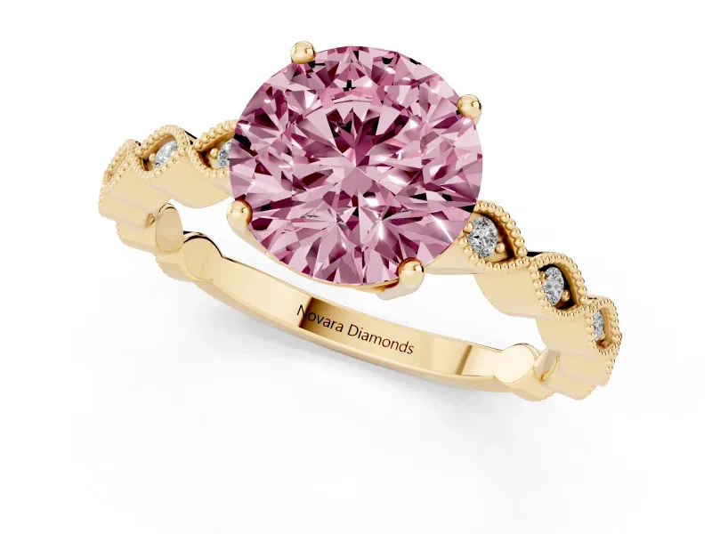 Fancy Pink Round Cut Diamond Solitaire Ring Set in Yellow gold with Infinity Twist Pavé Band