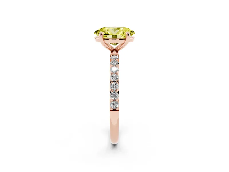 Fancy Yellow Oval Cut Diamond Solitaire Ring Set in Rose gold with Round Pavé Band and Prong Setting