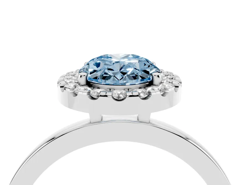 Fancy Blue Oval Cut Diamond Halo Solitaire Ring Set in Silver with Pavé Band and Prong Setting