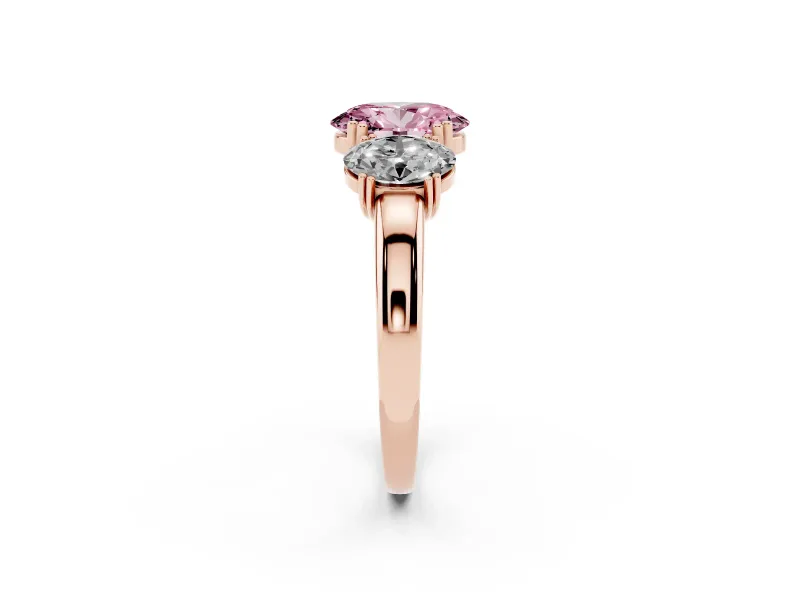 Fancy Pink Oval Cut Diamond Three-Stone Ring Set in Rose gold with Polished Band and Prong Setting