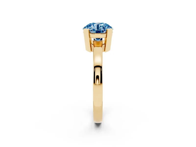 Fancy Blue Round Cut Diamond Solitaire Ring Set in Yellow gold with Prong Head and Smooth Polished Band