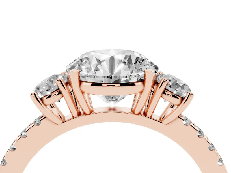 Round Cut Diamond Three-Stone Ring Set in Rose gold with Pavé Band and Graduated Sides