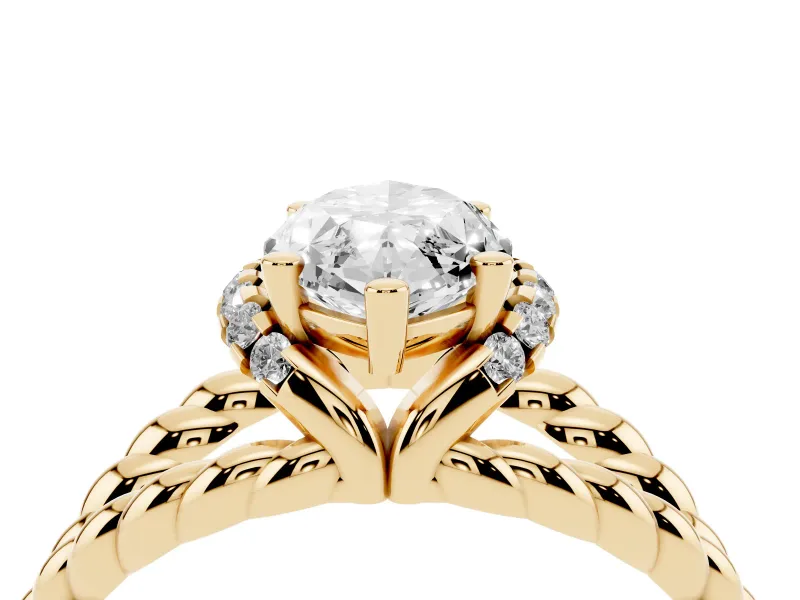 Marquise Cut Diamond Halo Ring Set in Yellow gold with Twisted Band and Prong Setting