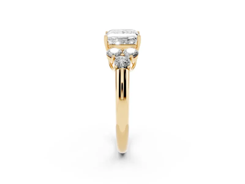 Princess Cut Diamond Cluster Ring Set in Yellow gold with Round Accent Stones and Prong Setting on a Plain Band
