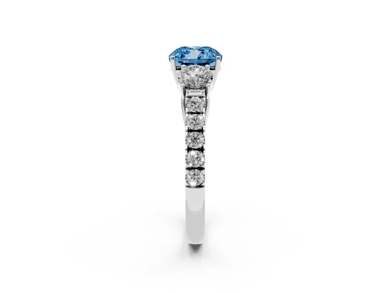 Fancy Blue Cushion Cut Diamond Three-Stone Ring Set in Silver with Round Side Stones and Delicate Pavé Band