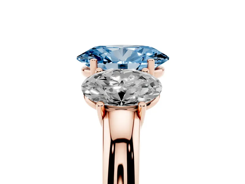 Fancy Blue Oval Cut Diamond Three-Stone Ring Set in Rose gold with Bold Center and Classic Band