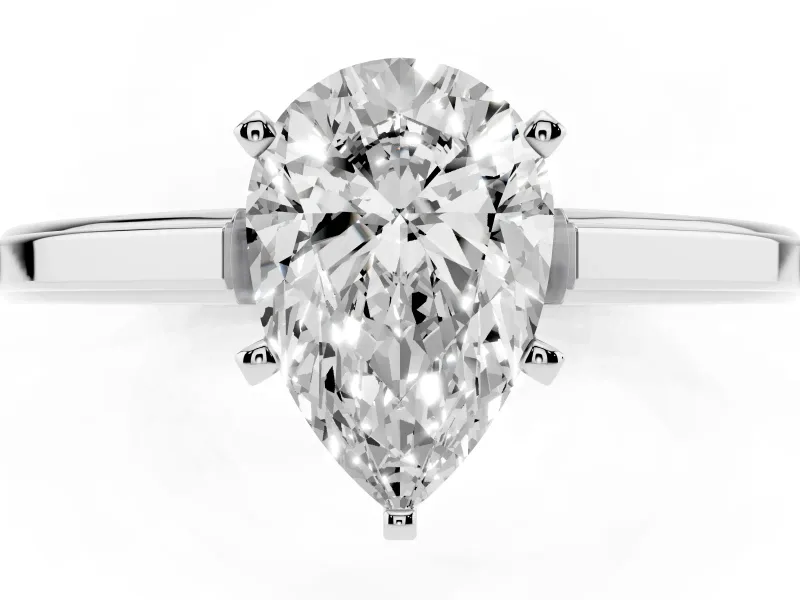 Pear Cut Diamond Solitaire Ring Set in White gold with Prong Setting and Classic Band