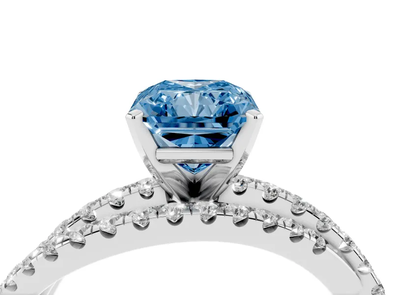 Fancy Blue Radiant Cut Diamond Solitaire Twist Band Ring Set in White gold with Pavé Setting and Prong Head