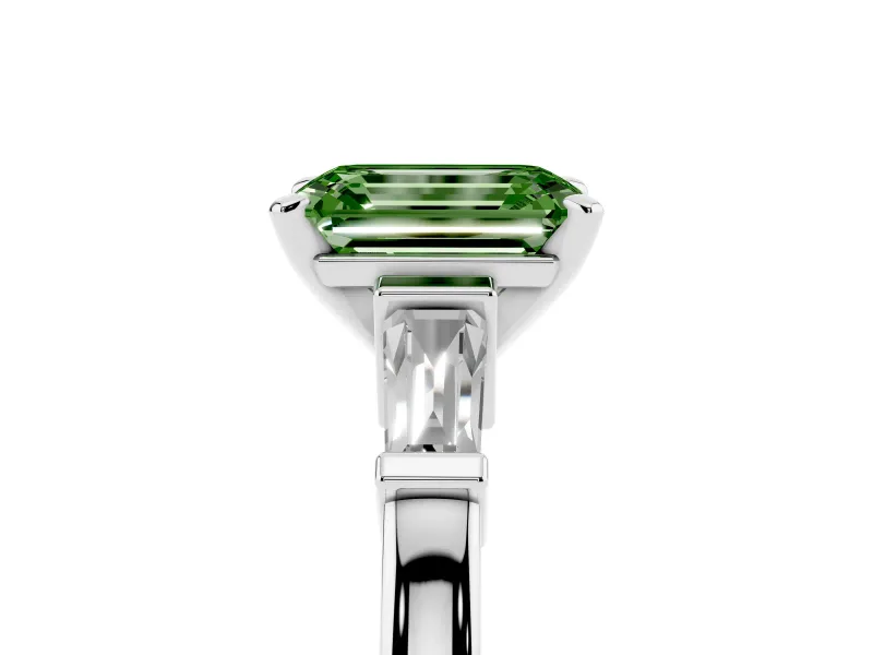 Fancy Green Emerald Cut Diamond Solitaire Ring Set in Platinum with Tapered Baguette Accents and Prong Setting