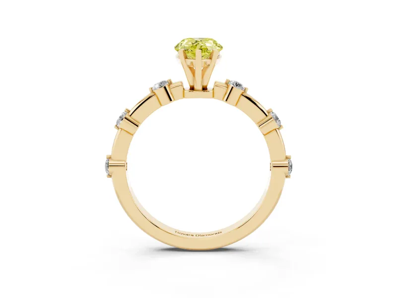 Fancy Yellow Pear Cut Diamond Solitaire Ring Set in Yellow gold with Bezel Set Side Stones and Prong Setting