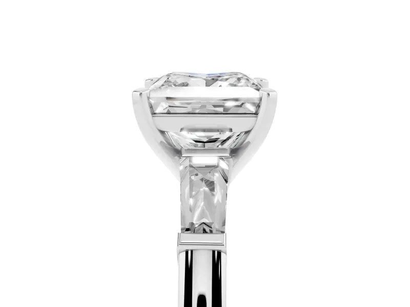 Princess Cut Diamond Solitaire Ring Set in White gold with Tapered Baguette Side Stones and Prong Setting