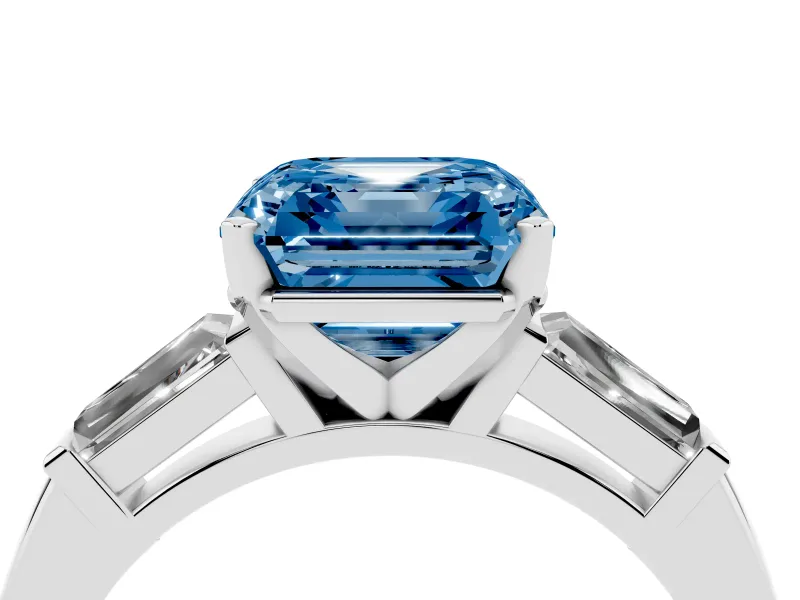 Fancy Blue Asscher Cut Diamond Solitaire Ring Set in White gold with Tapered Baguette Side Stones and Prong Setting