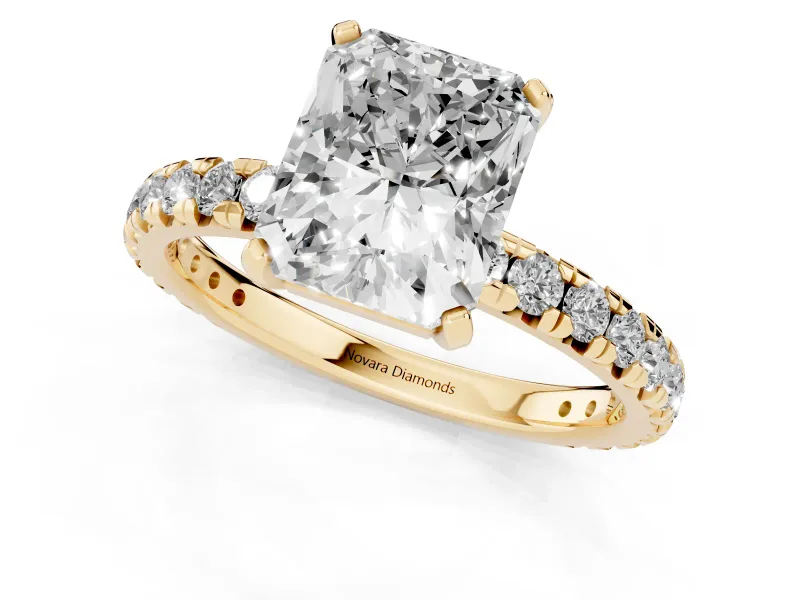 Radiant Cut Diamond Pavé Solitaire Ring Set in Yellow gold with Round Band and Prong Setting